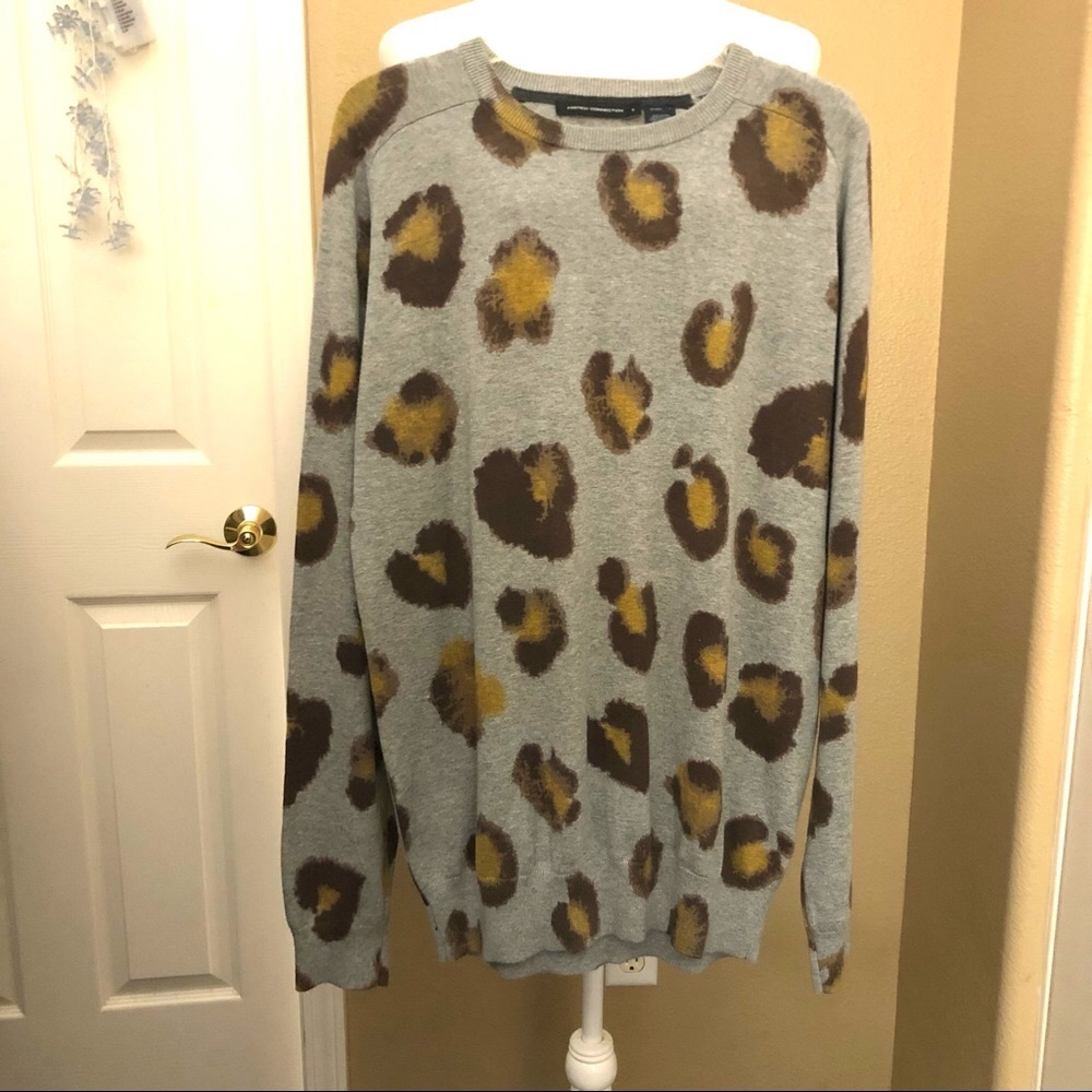 FRENCH CONNECTION animal print beautiful sweater. Background is gray. Un…